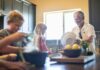 집에서 즐기는 슬로우 스포츠, 한국인 삶을 바꾼다 Grandfather and grandchildren prepare food in kitchen